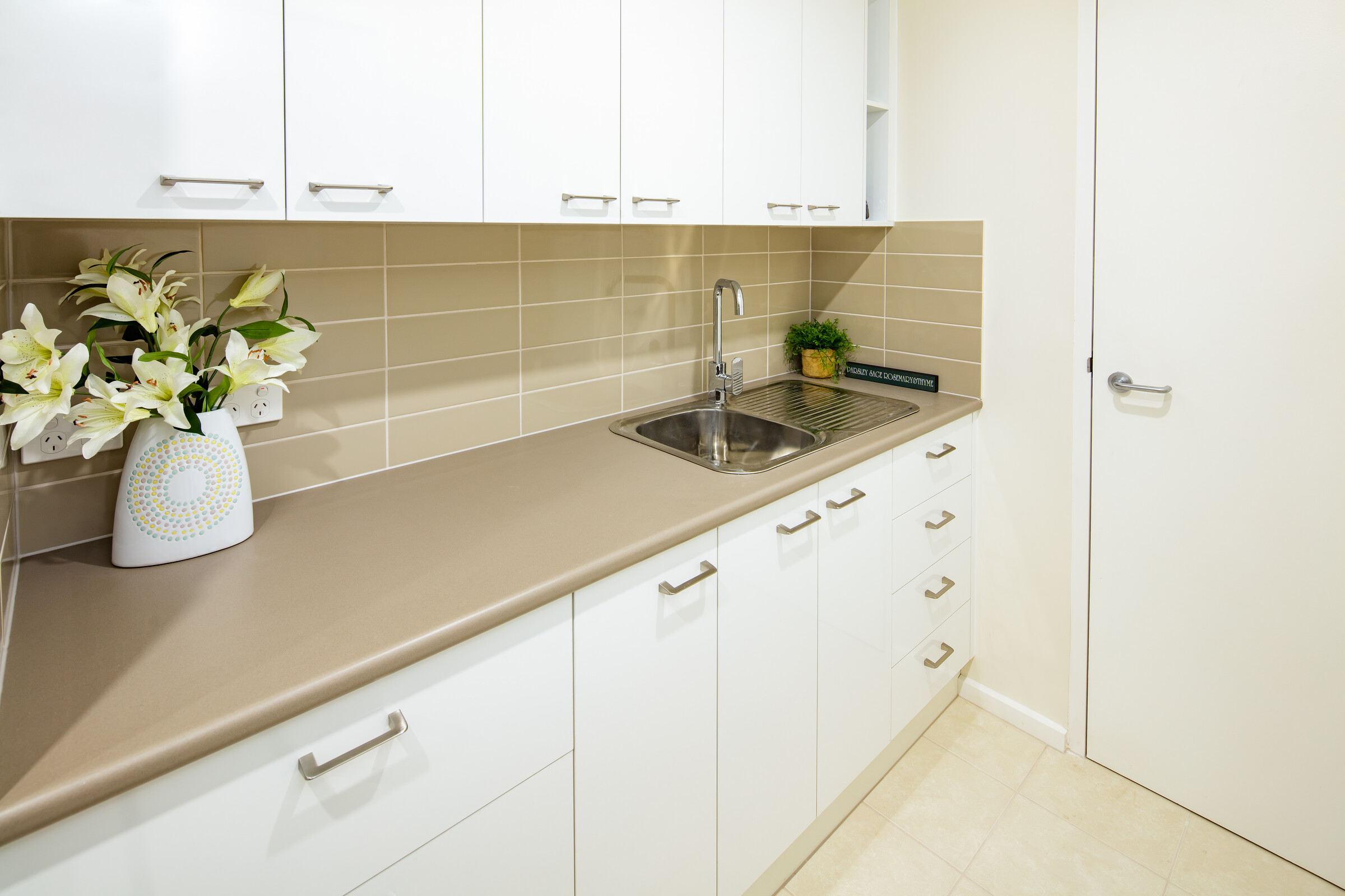 Meadowvale Village kitchenette with sink and lots of cupboard space