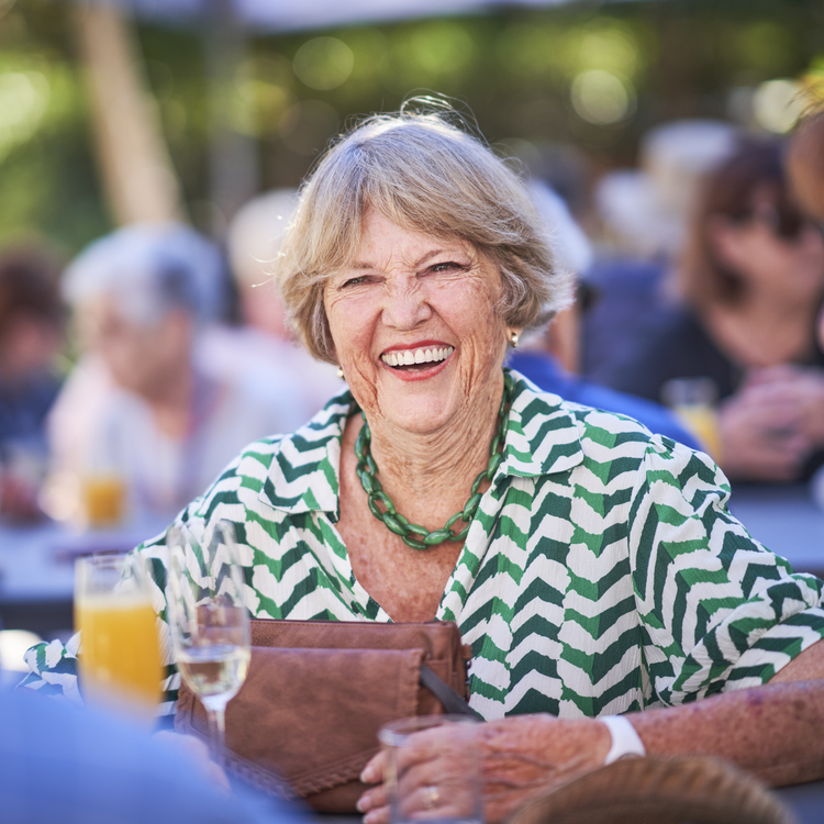 Happy senior at a festival