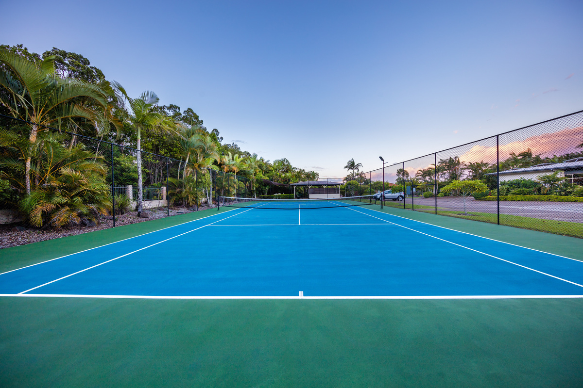 Bellflower Village's tennis court at sunset