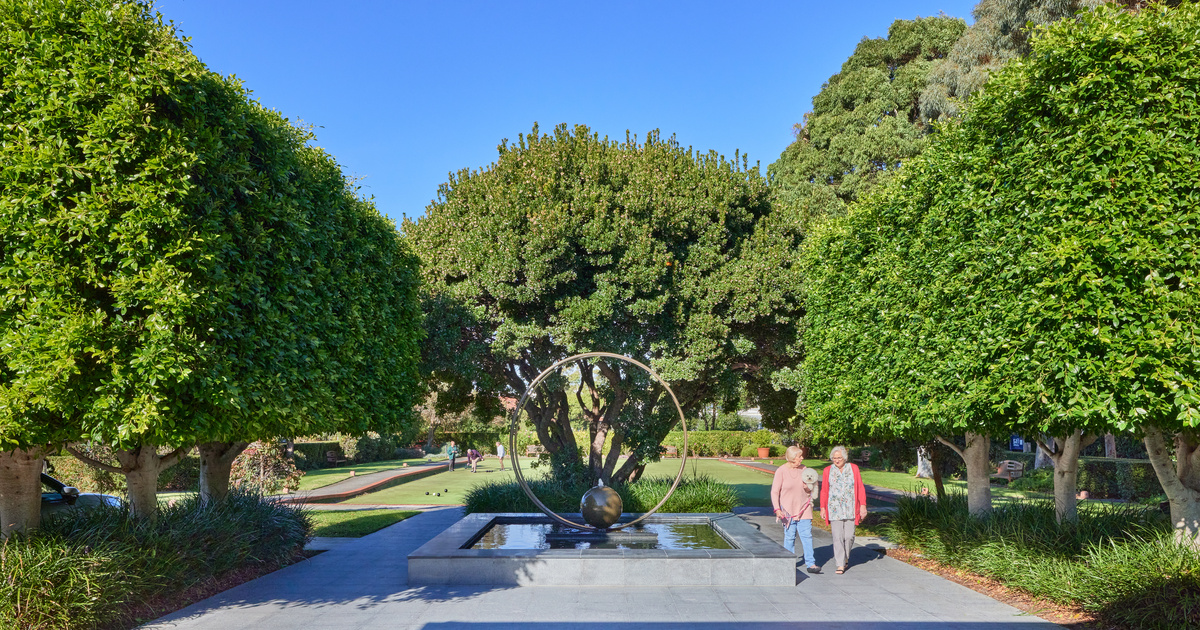 Classic Residences Brighton maintained landscaped gardens with modern water feature