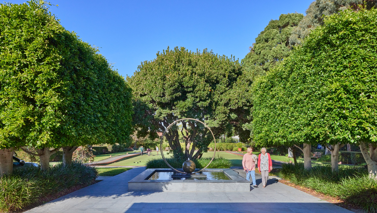 Classic Residences Brighton maintained landscaped gardens with modern water feature
