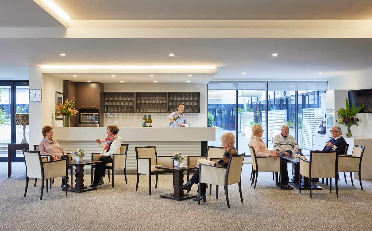 The Brighton on Bay bar area with tables and chairs