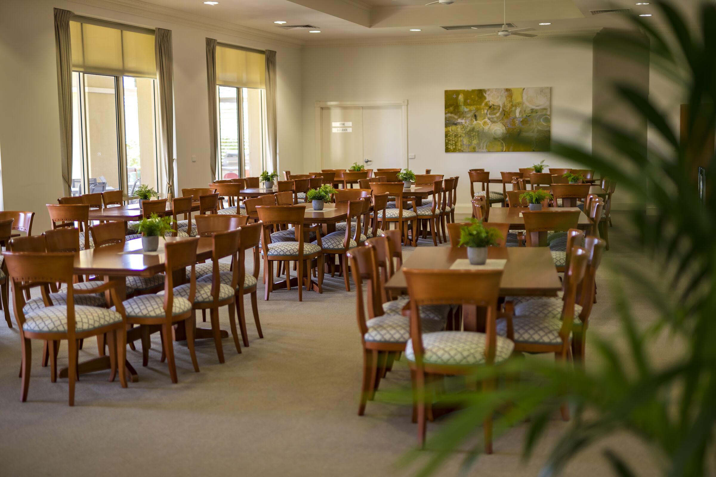 Waterford Valley Lakes main dining room with tables and chairs