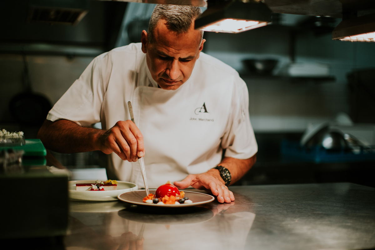 Ardency chef adds finishing touches to dessert