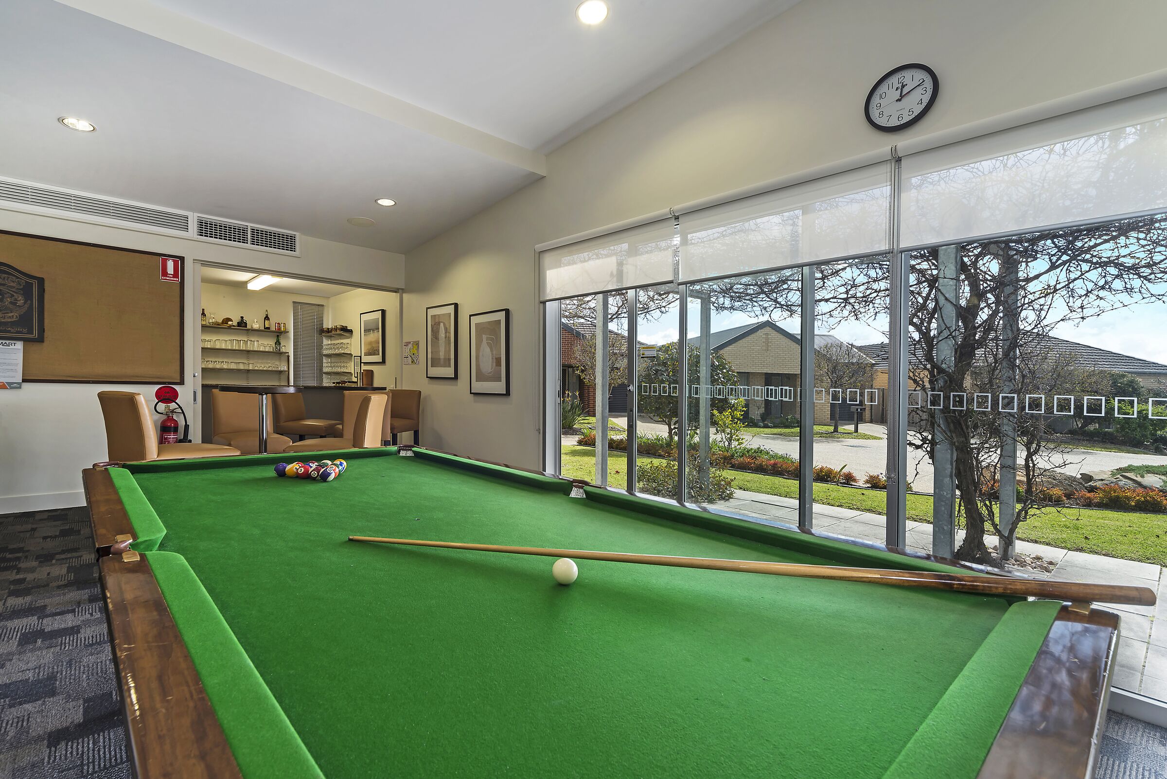 Trinity Green Village pool or snooker table area looking at a garden area