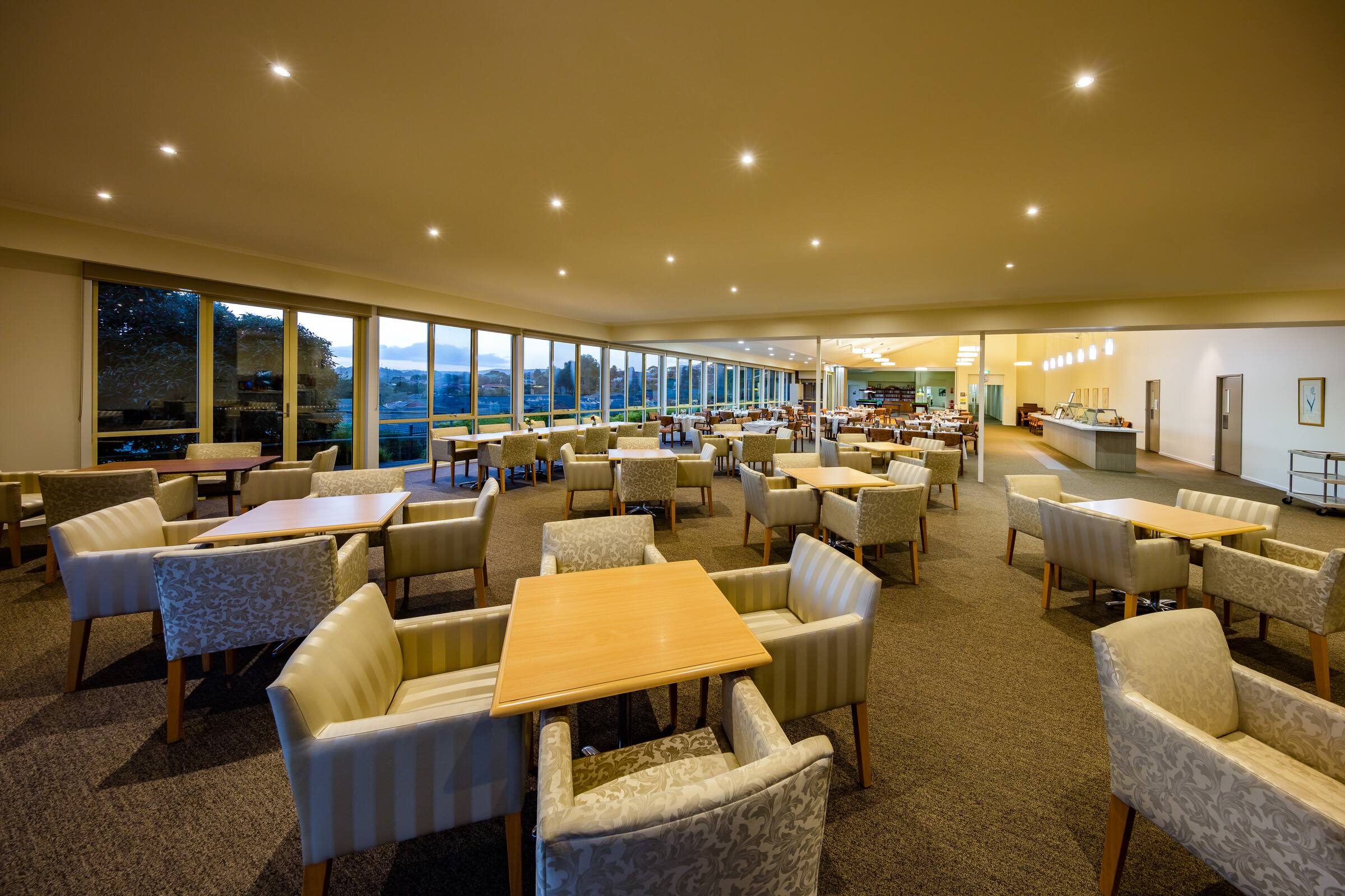 Meadowvale Village lounge area with seating looking towards dining area