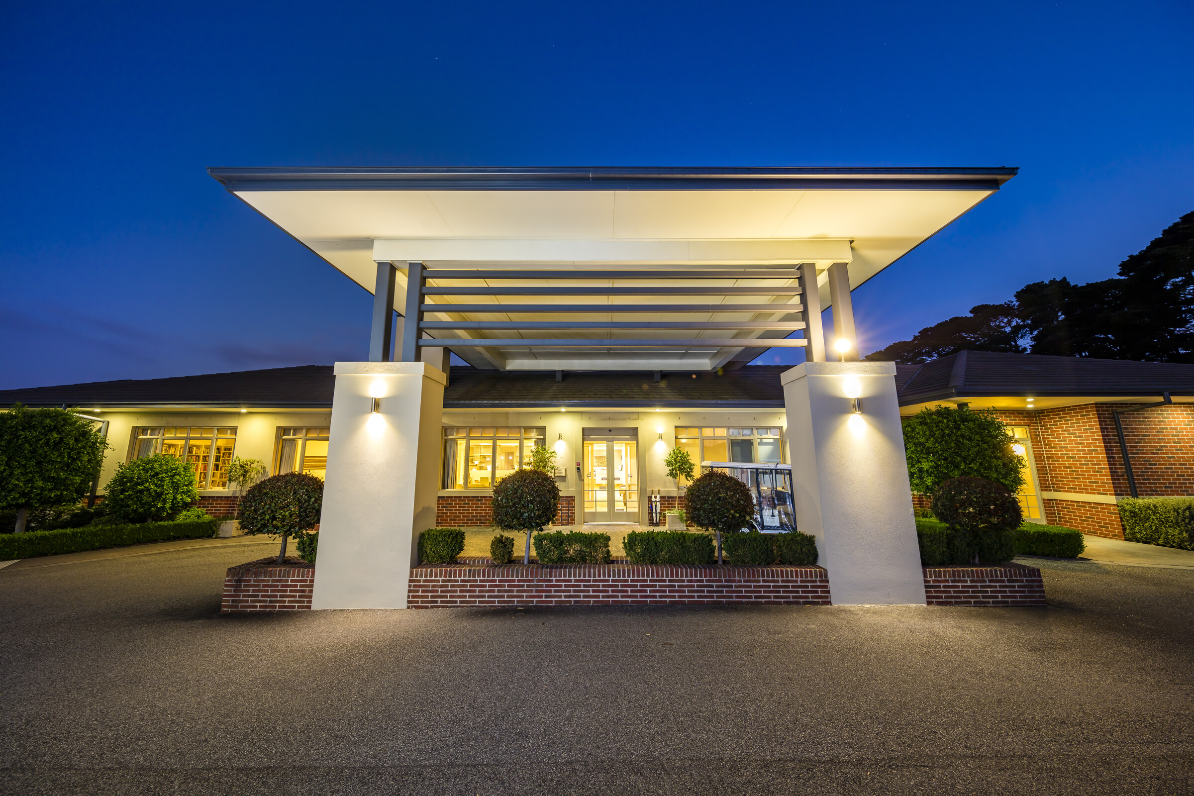 Waverley Country Club evening image of main entrance outside and driveway