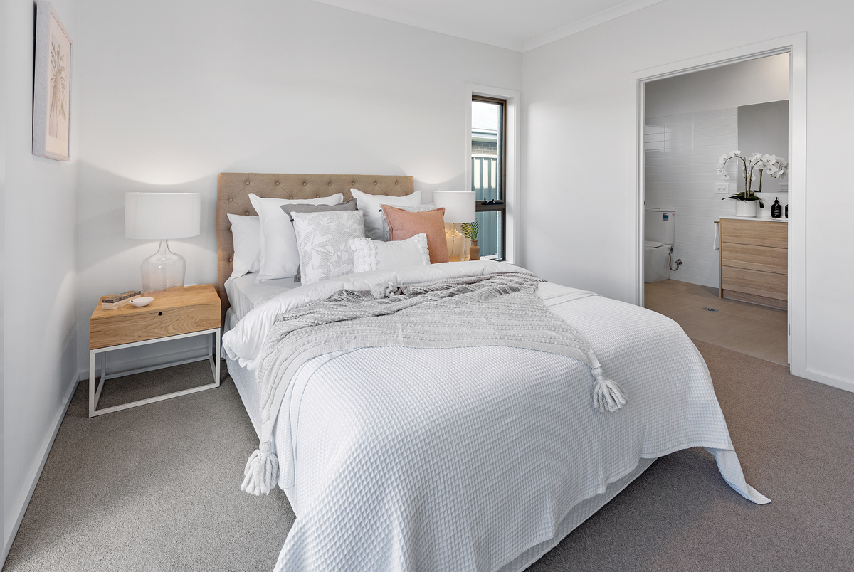 Sherwin Rise modern villa bedroom with ensuite bathroom