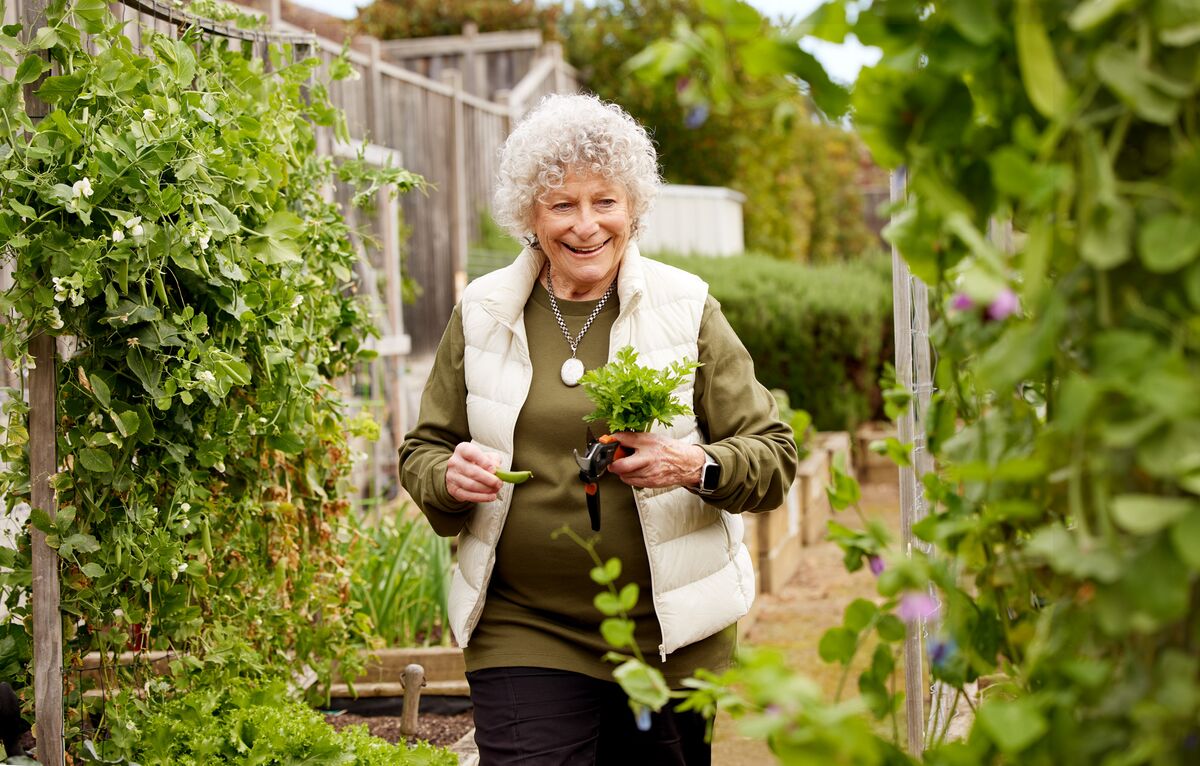 Resident Helen in the communal garden at her retirement village