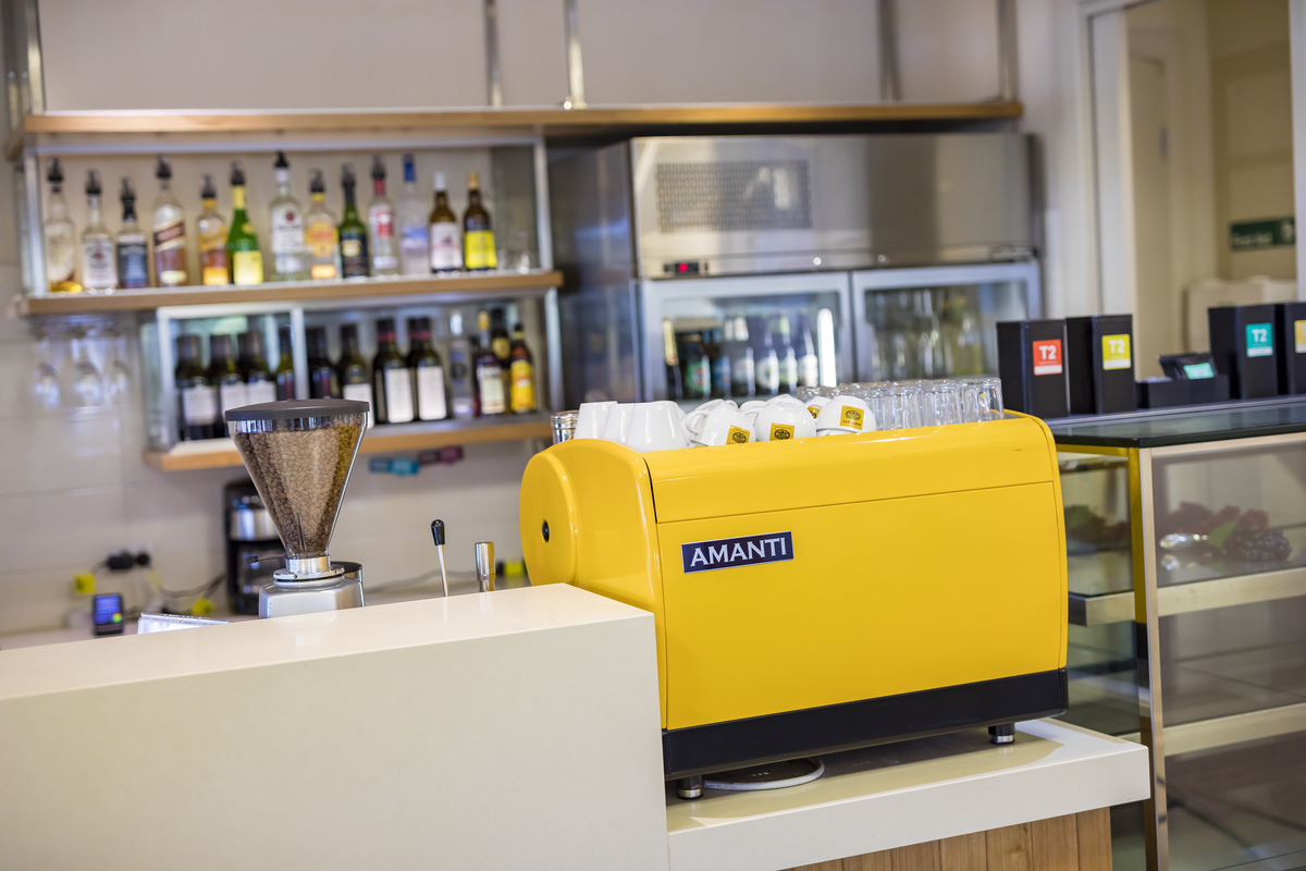 Waverley Country Club bar and cafe area with coffee machine and stocked drinks fridge