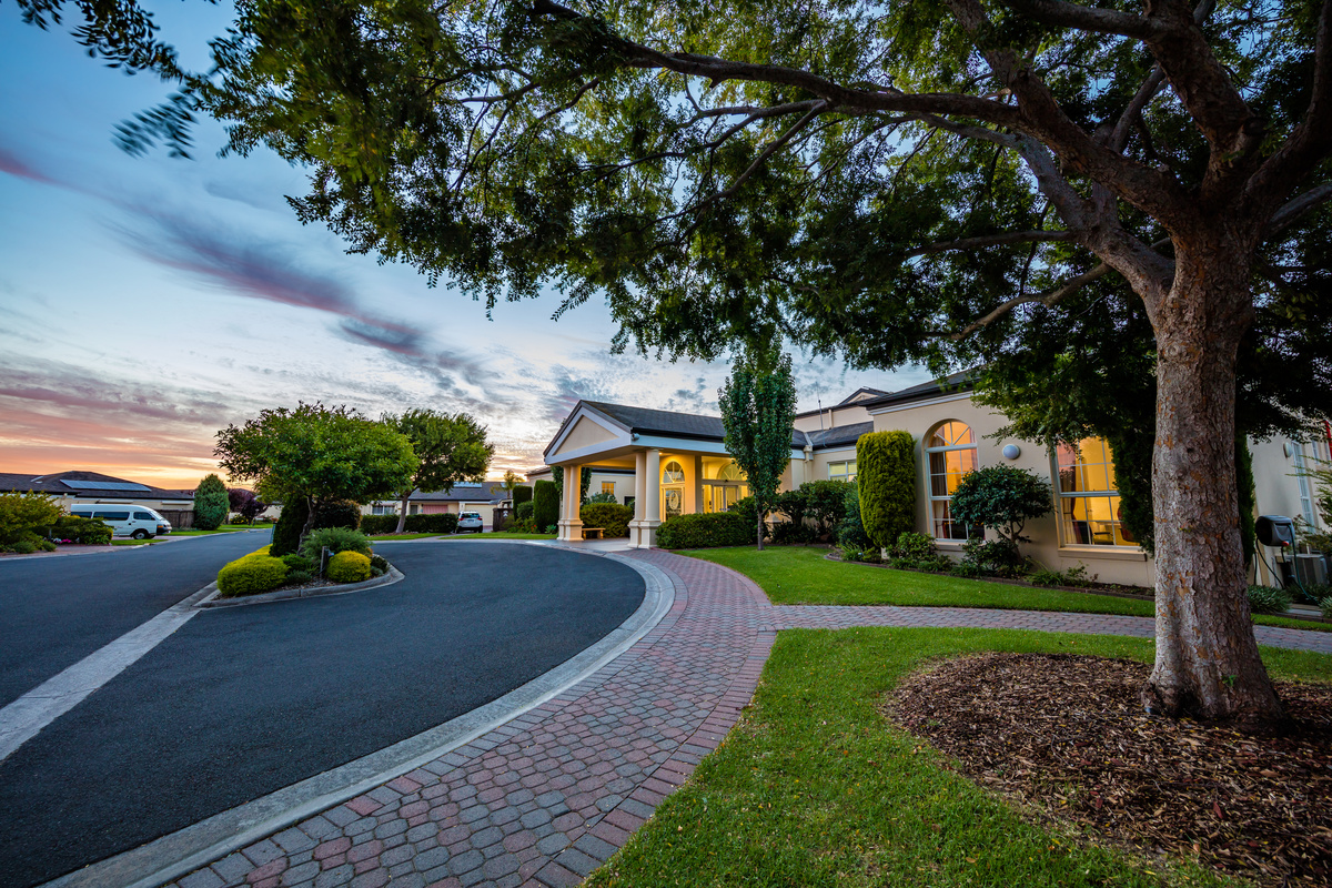 Port Phillip Village street view over landscaping looking towards main entrance