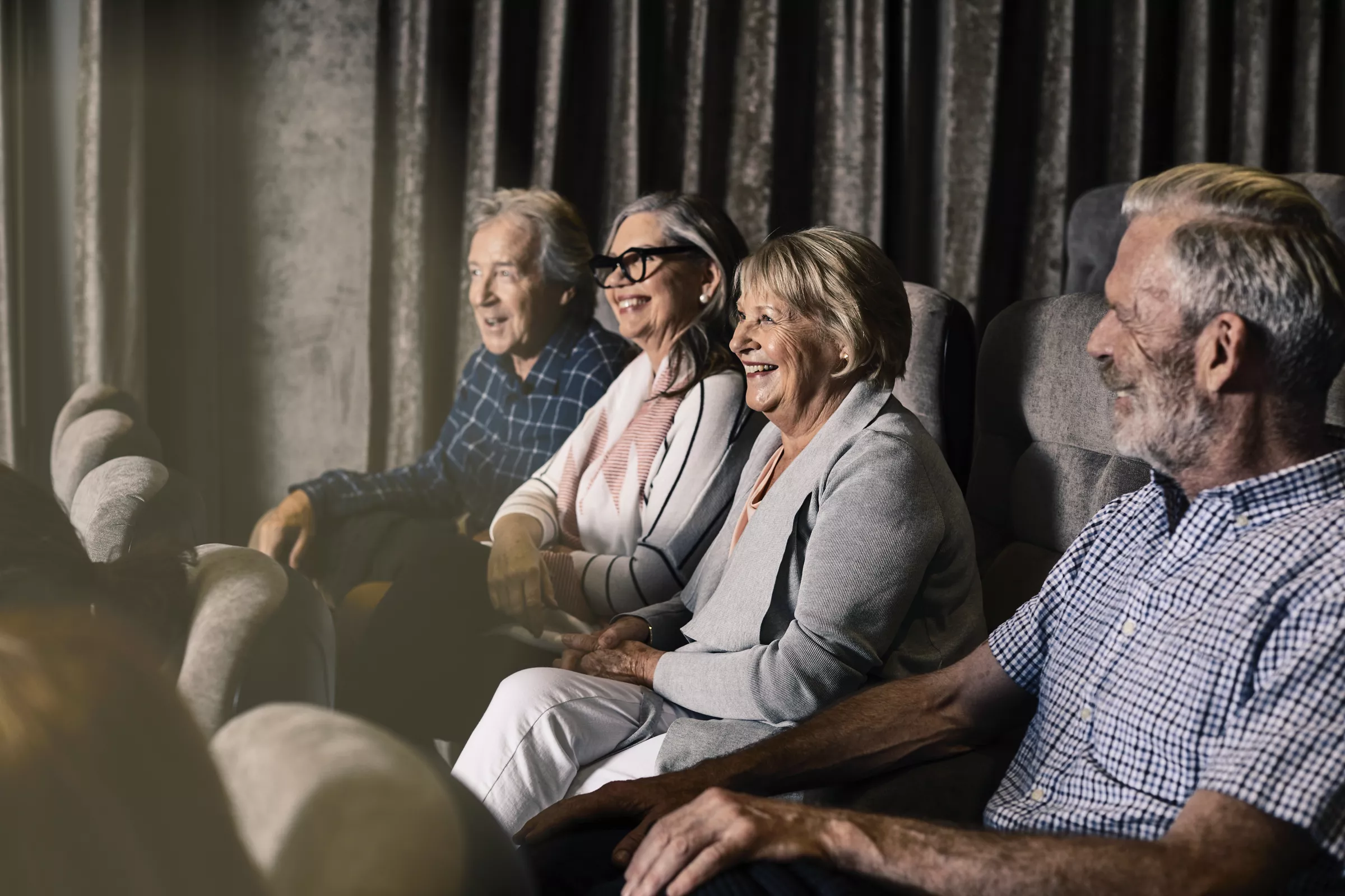 Group of seniors watching a movie