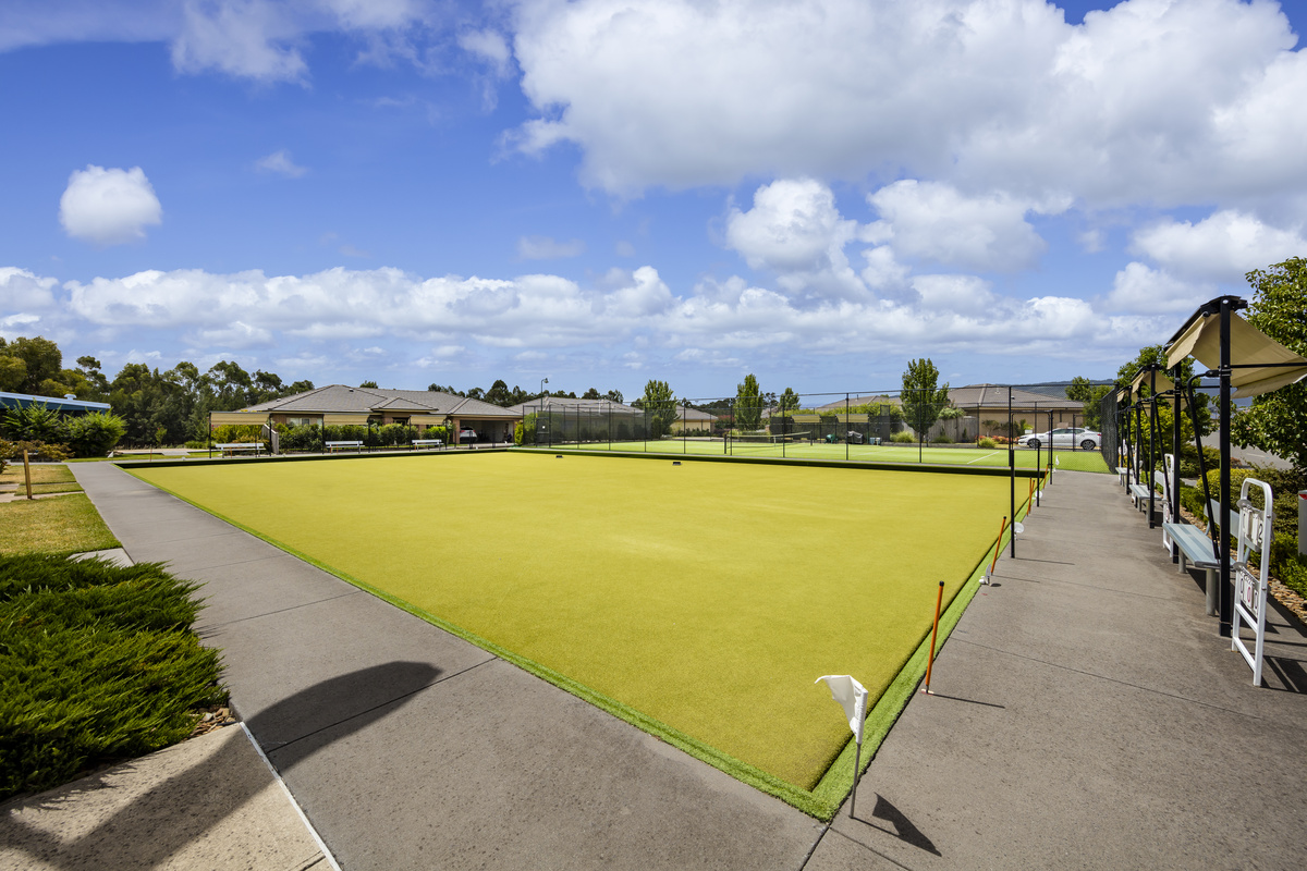 Waterford Park outdoor bowling green with seating and shade