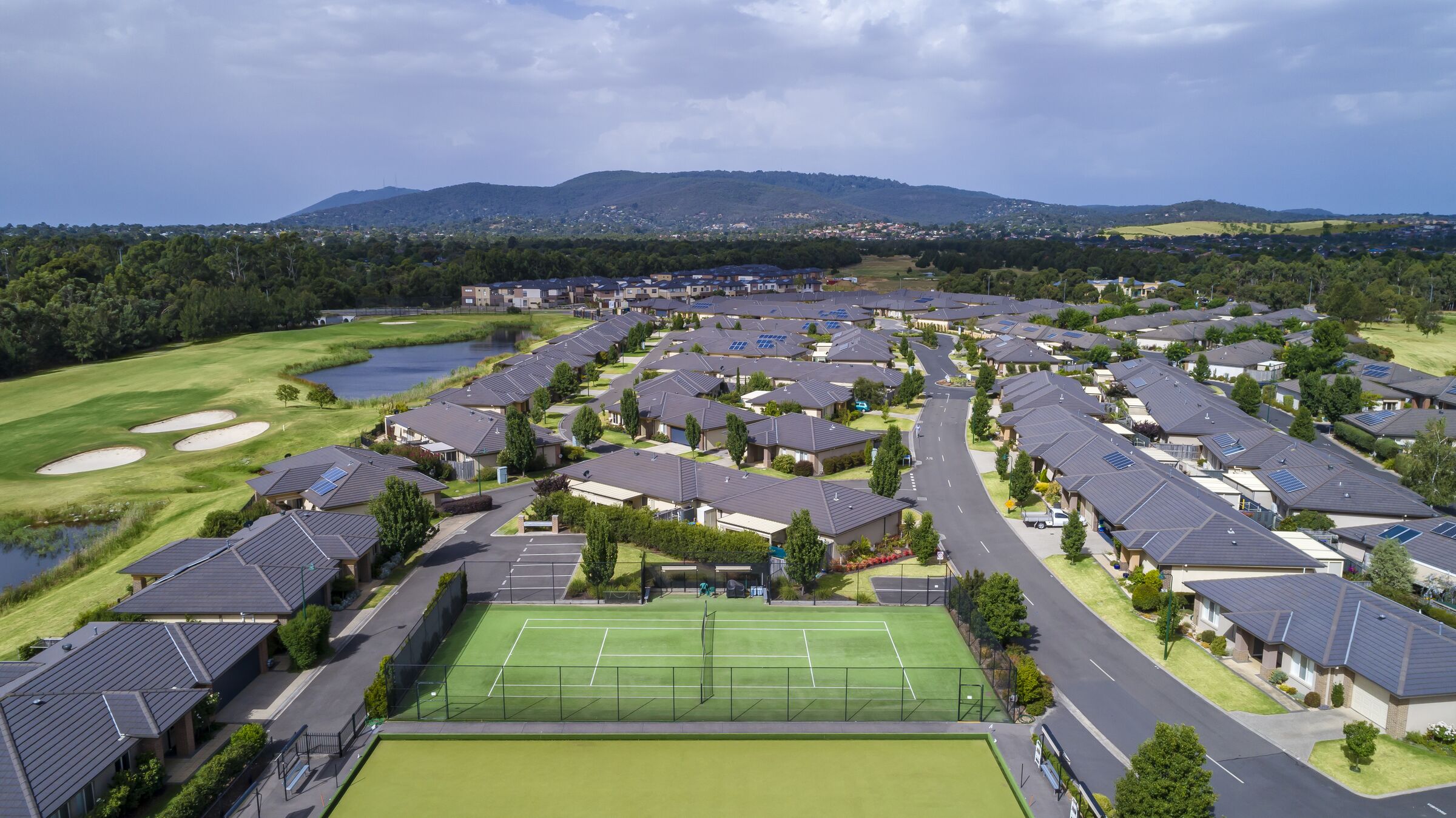 Waterford Park aerial image of site and surrounding district including golf course, lake and hills